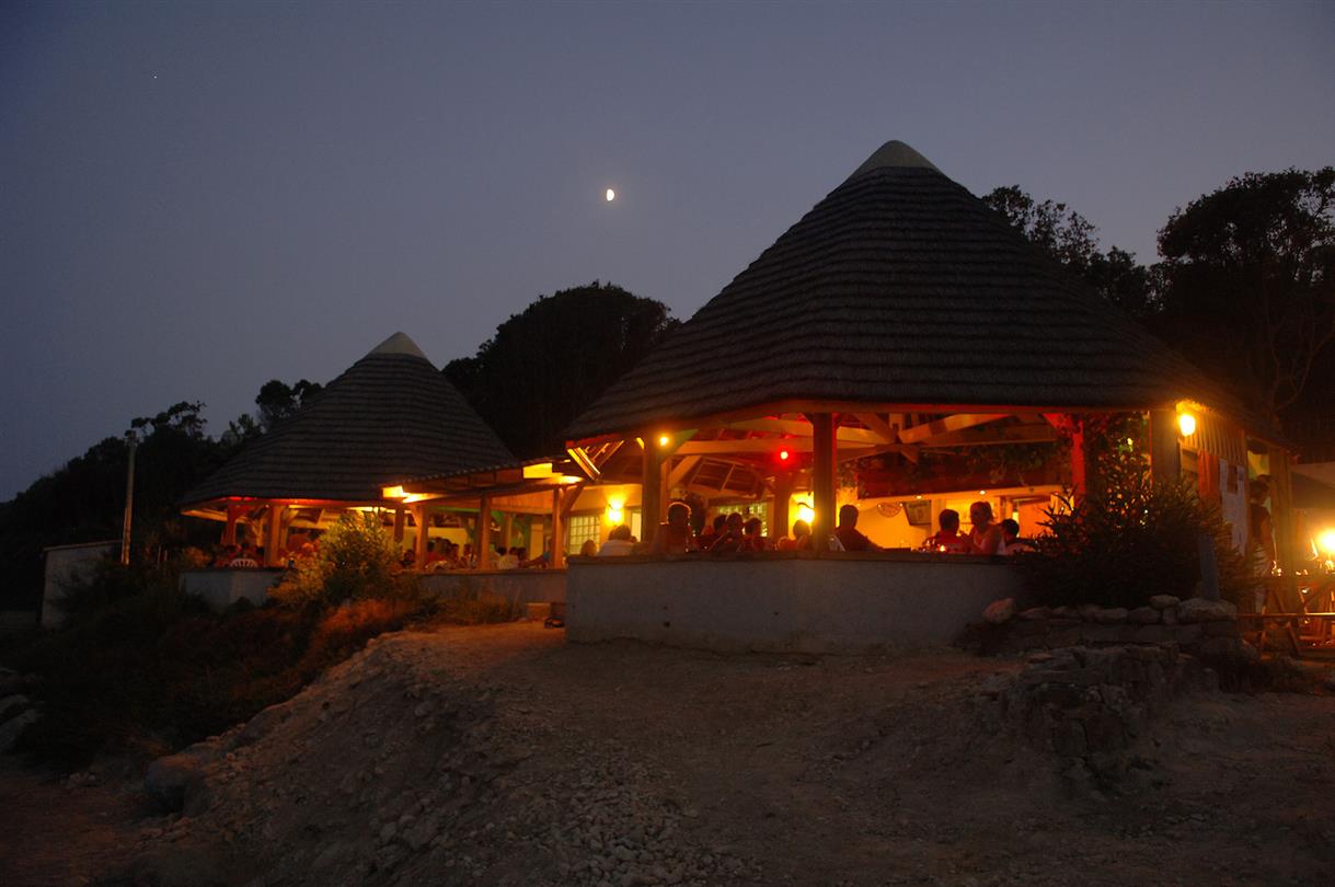 La Paillote by night - snack bar at the Bagheera 4-star campsite, south of Bastia