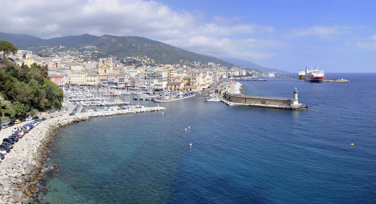 Port of Bastia - arrival by boat at the Village Vacances de Bagheera, Corsican naturist campsite