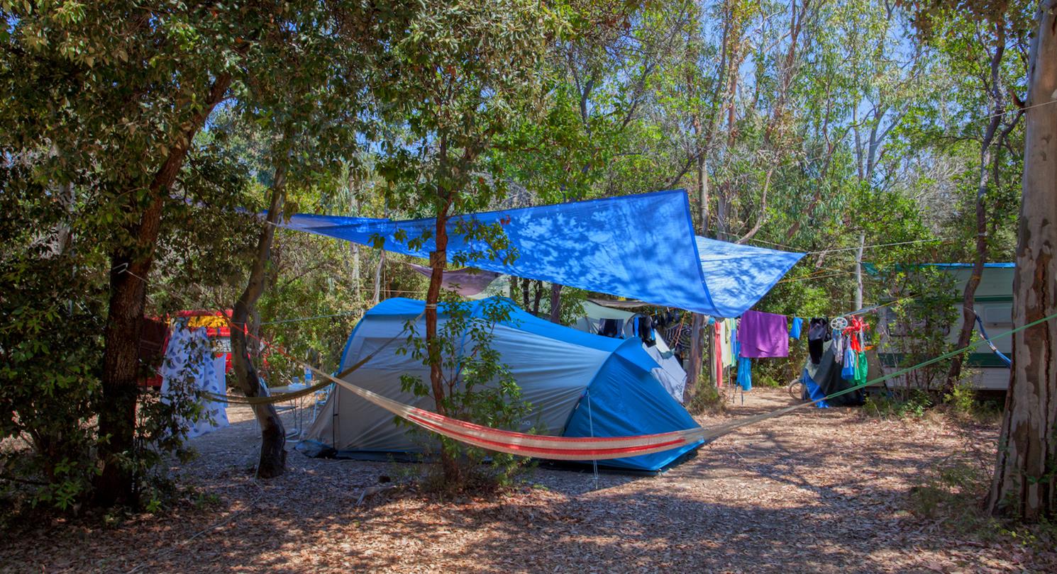 Tent pitch in the forest near the naturist beaches of Corsica