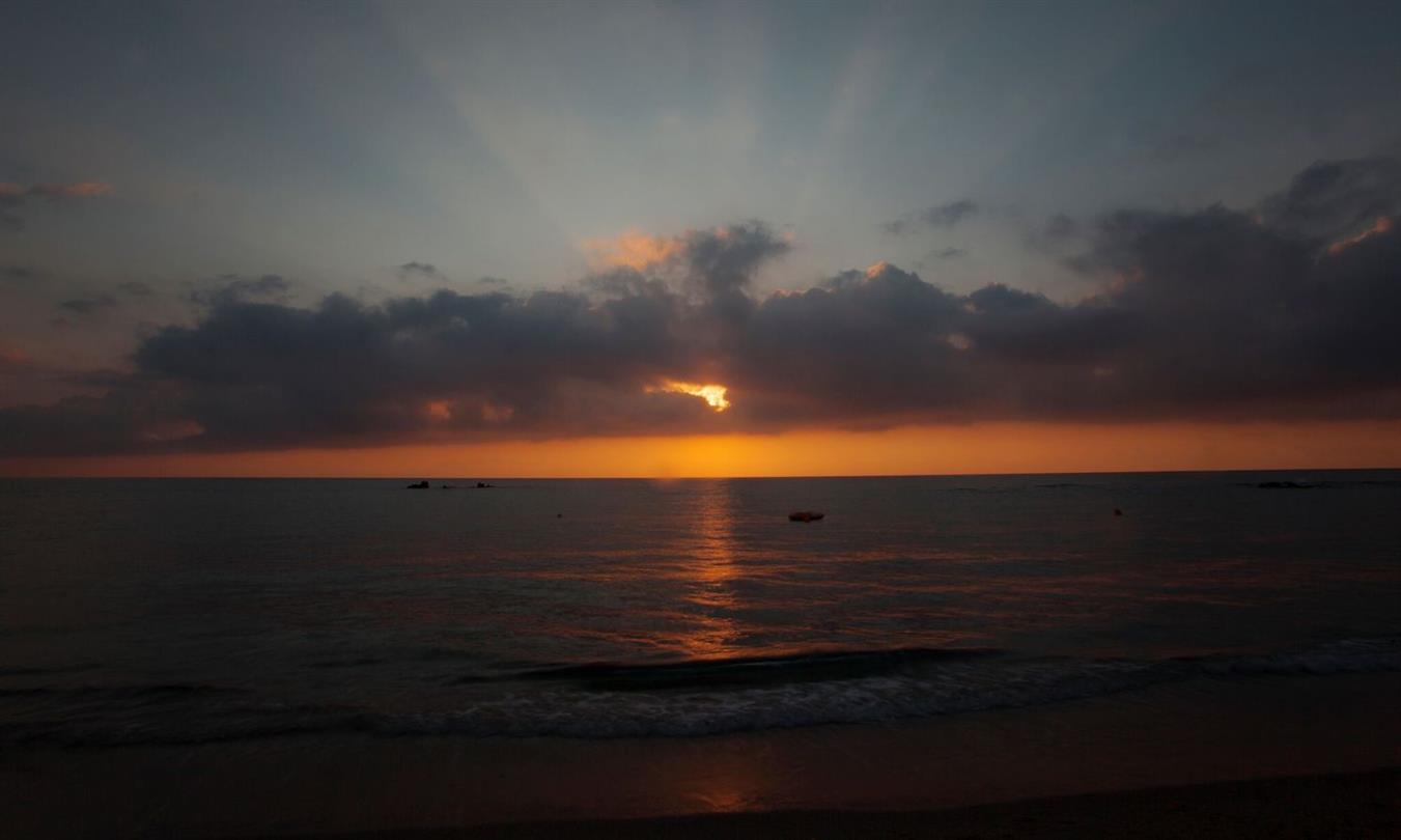 Sunset by the sea - Naturist holiday center