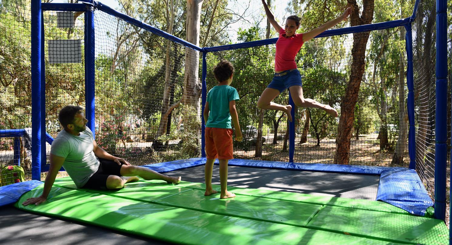 Family trampoline - naturist campsite Corsica