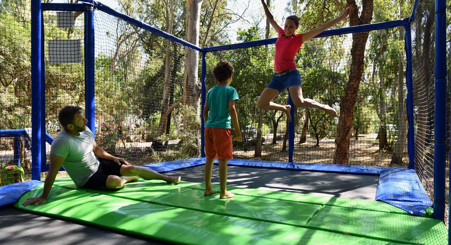 Family trampoline - naturist campsite Corsica