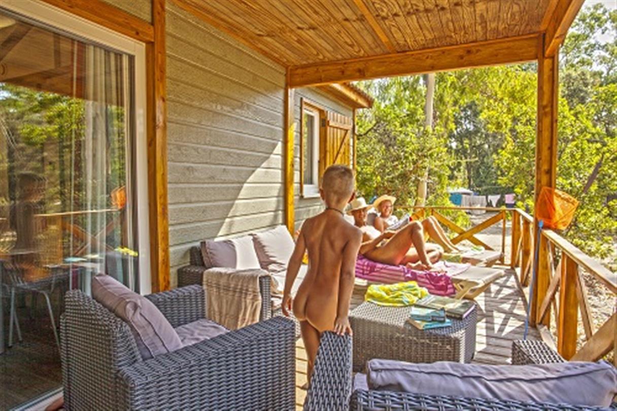  Family holidays, Chalet terrace in your naturist campsite in Corsica