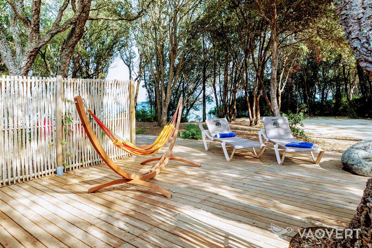 wooden terrace in front of the sea